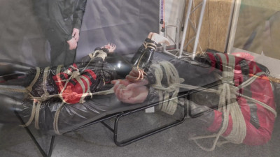 Myxxxy bound and gagged in shiny nylon Windbreaker
