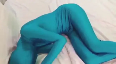 Zentai girl struggling