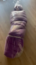 down suitbag bound in plastic bag