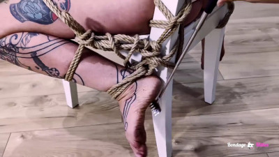 Girl in Rope Bondage and Foot Tickling