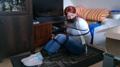 Redhead Tied up on The Floor in Jeans