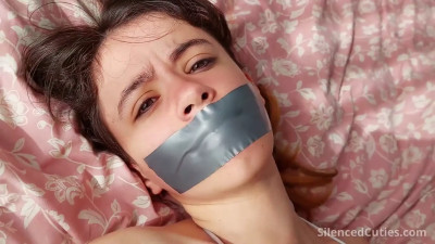 Tape gagged bikini girl