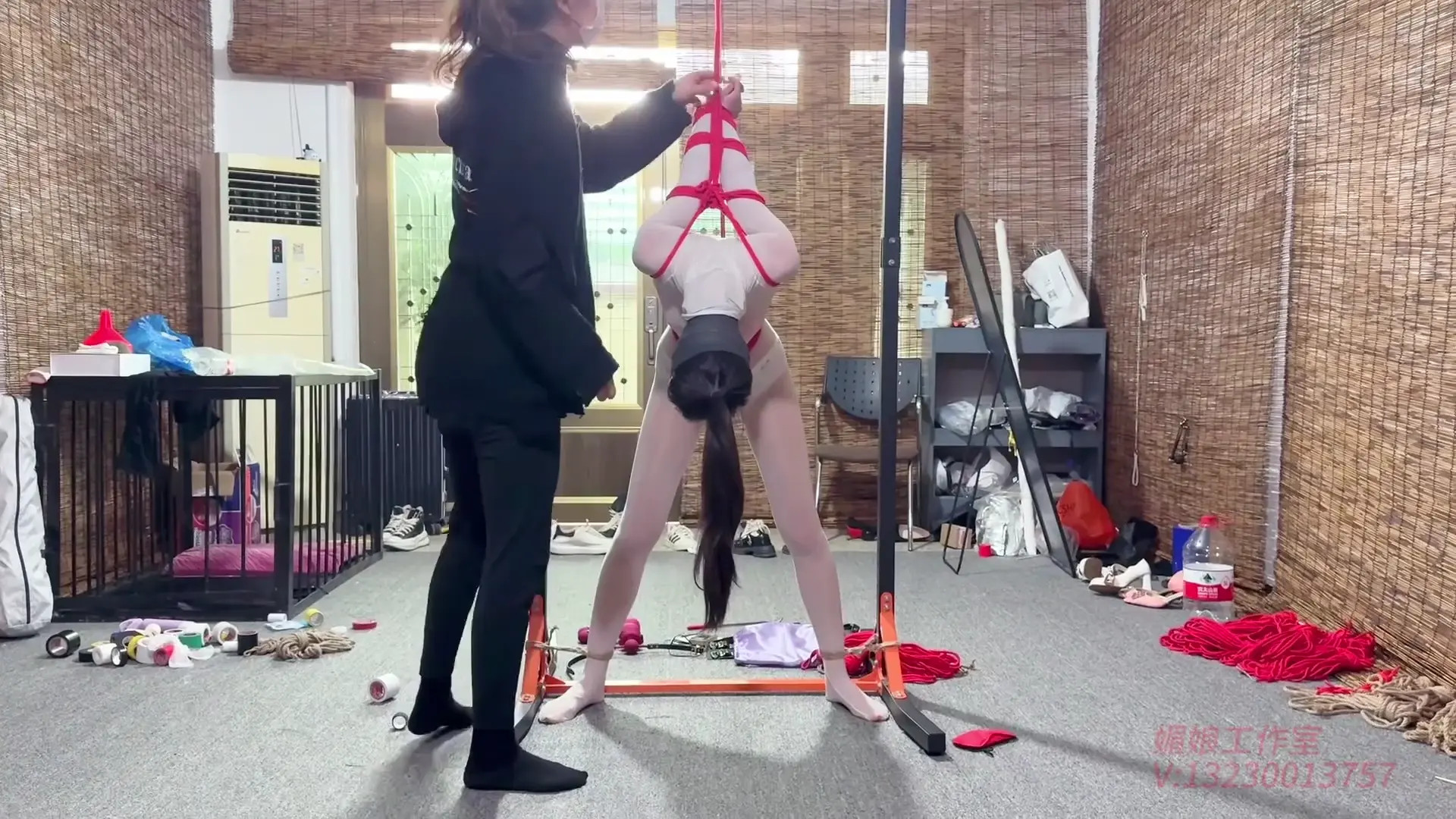 New Bondage Scene: Red Rope Domination: Woman Tied to Pole - Stream & Download HD | BondageVid.com