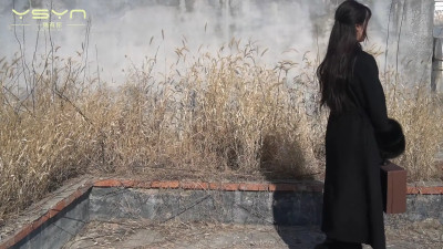Bondage Beauty: Elegant Black Coat & Stick Play