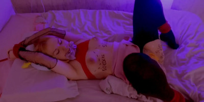Submissive blonde bedtied
