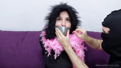 Streamer tape gagged by a fan (SilencedCuties.com)
