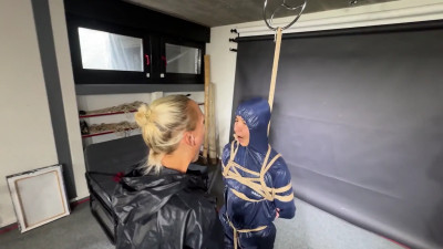Aiyana tied and gagged in Rainwear