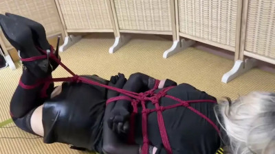 CD tightly bound and placed to struggle