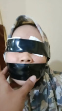 Taped Eyes Indonesian Captive