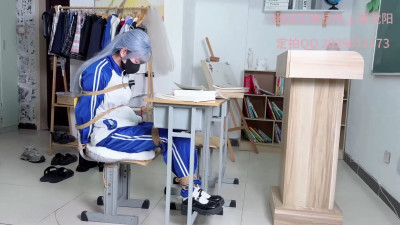 Caged bird in the classroom