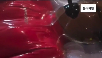 Red catsuit in vacbed