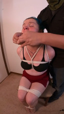 Mindy chairtied in her tennis skirt