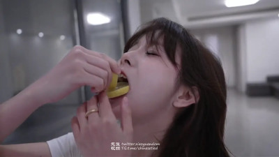 Girl eat lemon 1