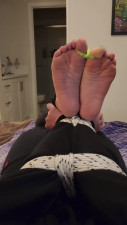 Female friend getting tickled in a tight hogtie