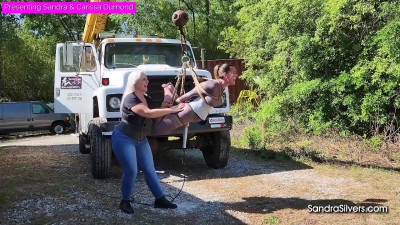 Suspended screaming orgasms under the crane’s sway!