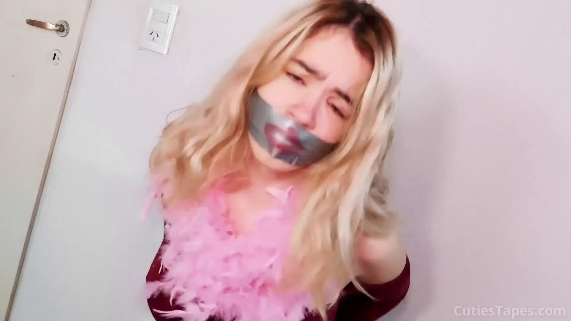 New Bondage Scene: GAGGED with TAPE and Feathers - Stream & Download HD | BondageVid.com