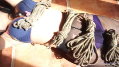 Cute Asian girl hogtied