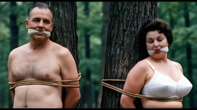 Mature couple kidnapped in the woods